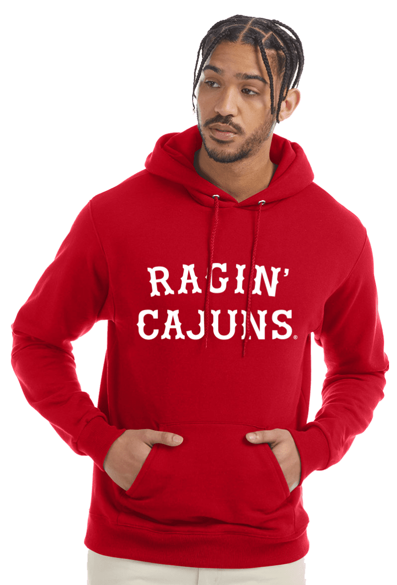 A man wearing a red hoodie with the words " ragin cajuns ".