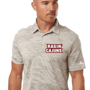 A man wearing a gray shirt with the words ragin cajuns on it.