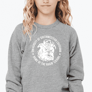 A girl wearing a sweatshirt with an image of a bulldog on it.